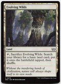 Evolving Wilds NM C Commander: Duskmourn: House of Horror 274
